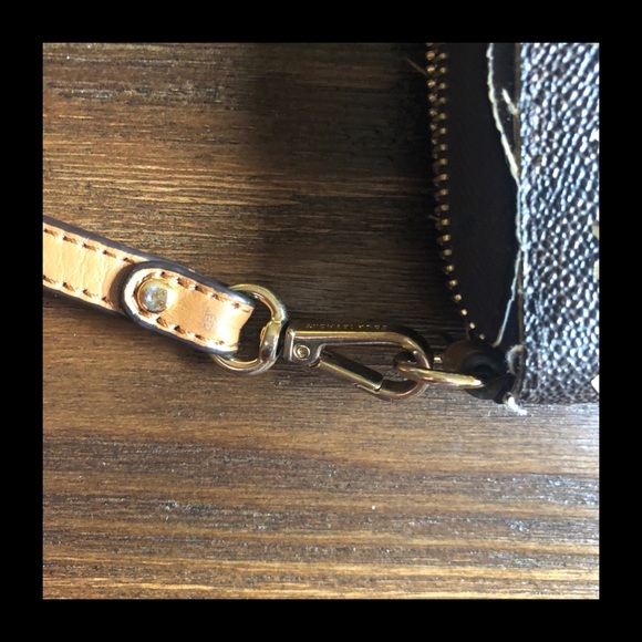 Michael Kors Perforated Zippered Wallet and Wristlet - Picture 4 of 11